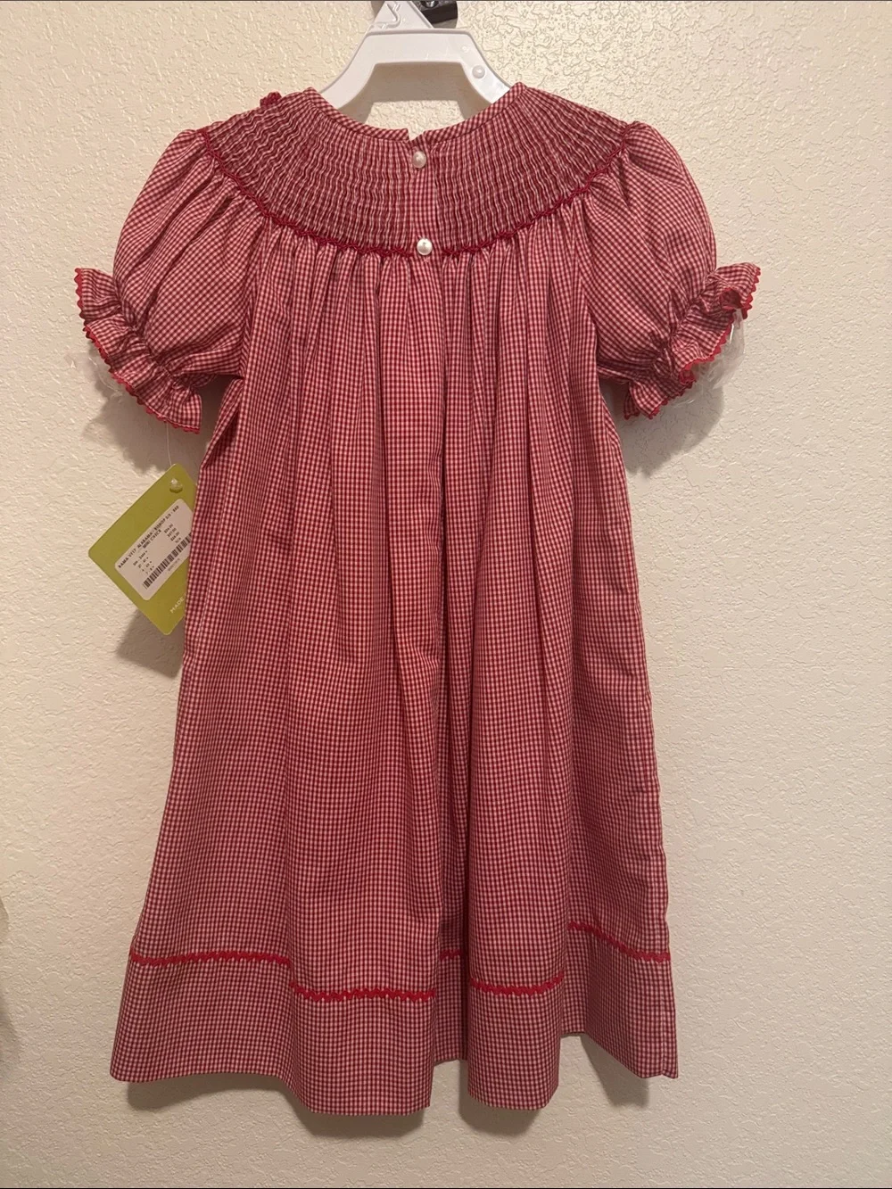Red Gingham Smocked Girls' Dress with cheerleaders